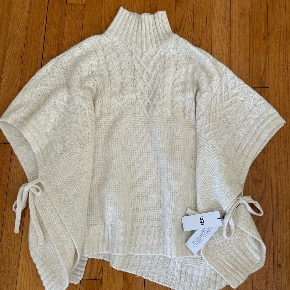 Beautiful brand new with tags XS/S cream poncho